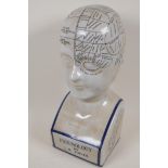 A porcelain phrenology head, 16" high