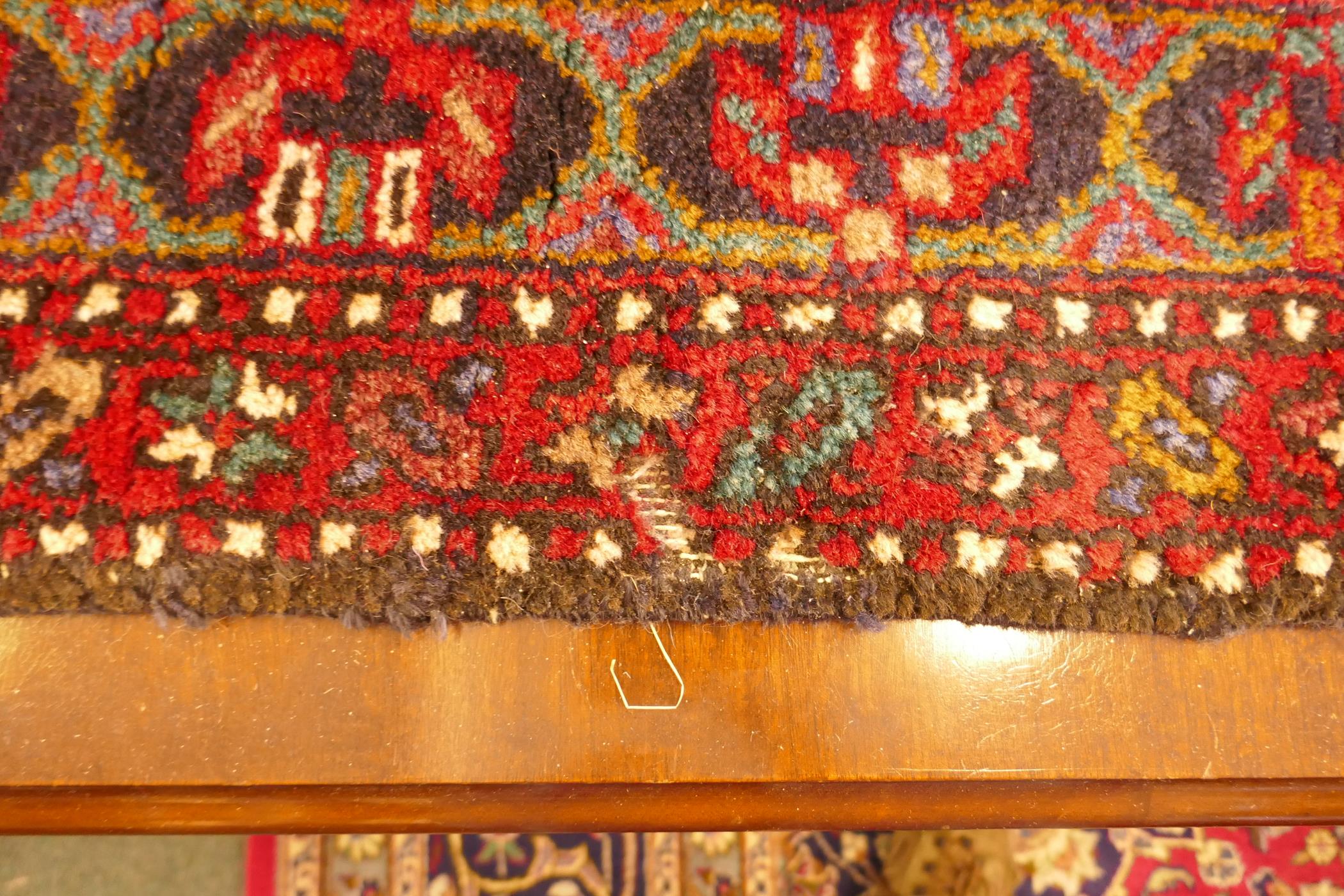 A thick pile red ground hand woven Persian Heriz runner with a cross medallion design, 42" x 138", - Image 3 of 7