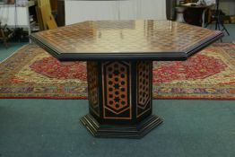 A slate centre table inlaid with marble veneered decoration, minor repair to top and loss to base,