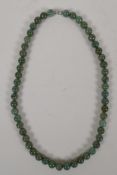 A string of spinach jadite beads, 20" long