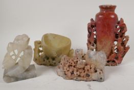 Three Chinese carved soapstone vases, AF, and a carved soapstone bookend, largest 7½"