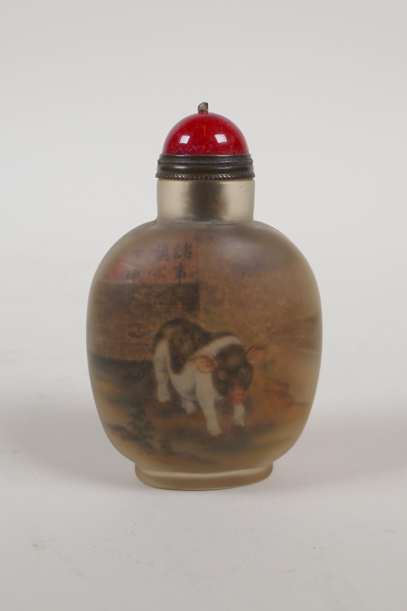 A Chinese reverse decorated glass snuff bottle depicting saddleback pigs, 3" high - Image 2 of 2