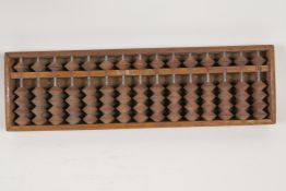 A Chinese wood abacus, 13" x 4"