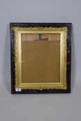An early C20th gilt picture frame, mounted in a glazed mahogany box frame, 17" x 20" x 2"