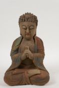 A Chinese carved and painted wood figure of Buddha, 8½" high