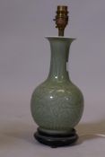 A celedon glazed porcelain table lamp, 13" high