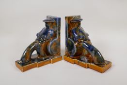 A pair of amber and blue drip glazed porcelain bookends in the form of Chinese rickshaw pullers, 6½"