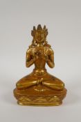 A Sino Tibetan gilt bronze figure of Buddha seated in meditation, double Vajra mark to base, 8" high