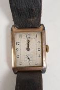 An Art Deco gentleman's 9ct gold vintage Swiss wristwatch, with engine turned dial, Arabic