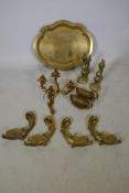 A pair of C19th brass fire dogs, a three branch wall sconce, tray etc and a set of four C19th bronze