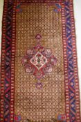 Beige ground hand woven Persian Kulayi village rug, 118" x 56"
