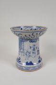 A Chinese crackleware censer/taper holder with blue and white decoration of figures in a garden, 4