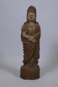 A carved and painted wood figure of Quan Yin, 24" high