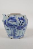 A Chinese blue and white porcelain wine jar with four lug handles, decorated with a landscape,