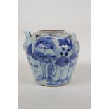 A Chinese blue and white porcelain wine jar with four lug handles, decorated with a landscape,