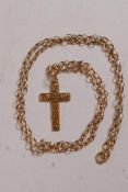 A 9ct gold crucifix on a 9ct gold belcher link chain, 6g