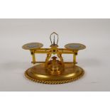 A set of ormolu postage scales with inset banded agate panels, 7" wide