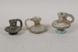 Three small Islamic glass perfume/oil jugs, largest 2½" high