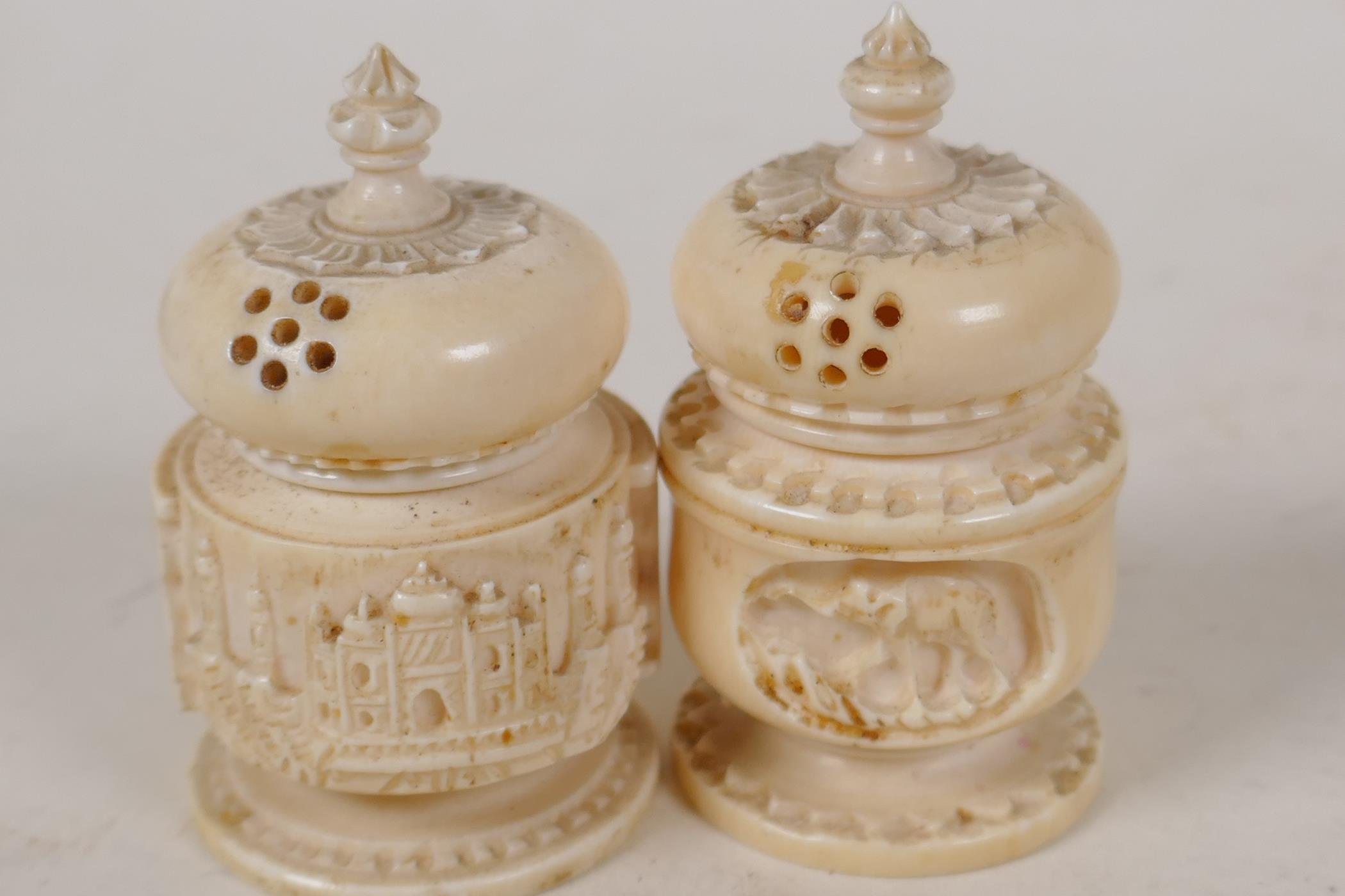 An Indian ivory cruet carved as temple towers, 2" high, and a similar smaller cruet - Image 3 of 4