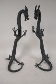 A pair of detailed Chinese bronze figures of dragons, 15½" high