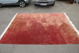 A contemporary burgundy deep pile wool carpet with an oriental bamboo design, labelled Douglas, 108"