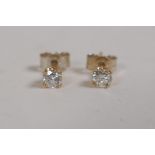 A pair of 14ct yellow gold diamond stud earrings, approx 40 points