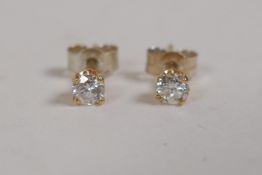A pair of 14ct yellow gold diamond stud earrings, approx 40 points