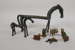 An Indo Persian bronze horse, and another smaller, and a collection of miniature bronze incense