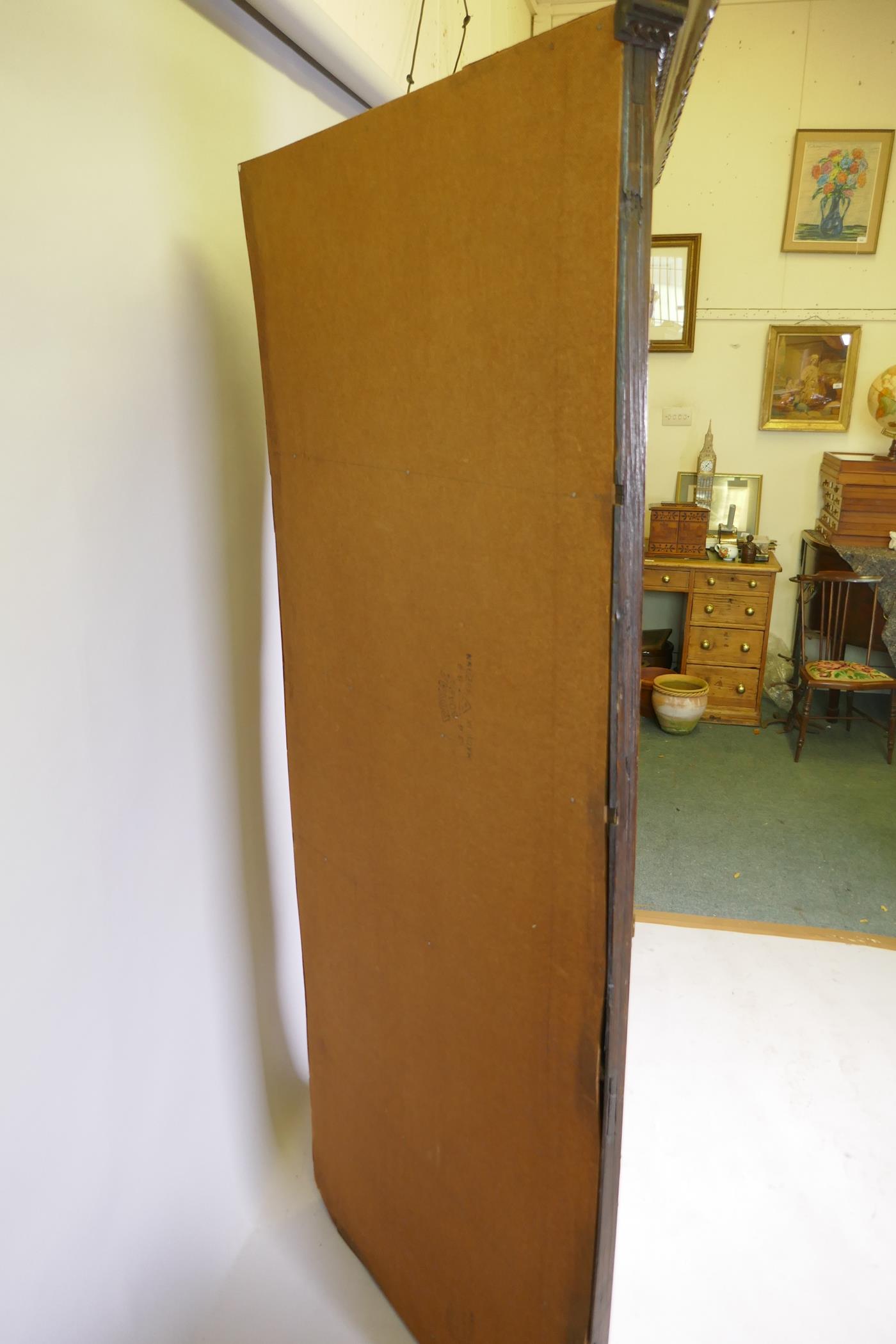 An antique oak corner cabinet with two glazed doors over two doors with carved panels, adapted, - Image 5 of 5