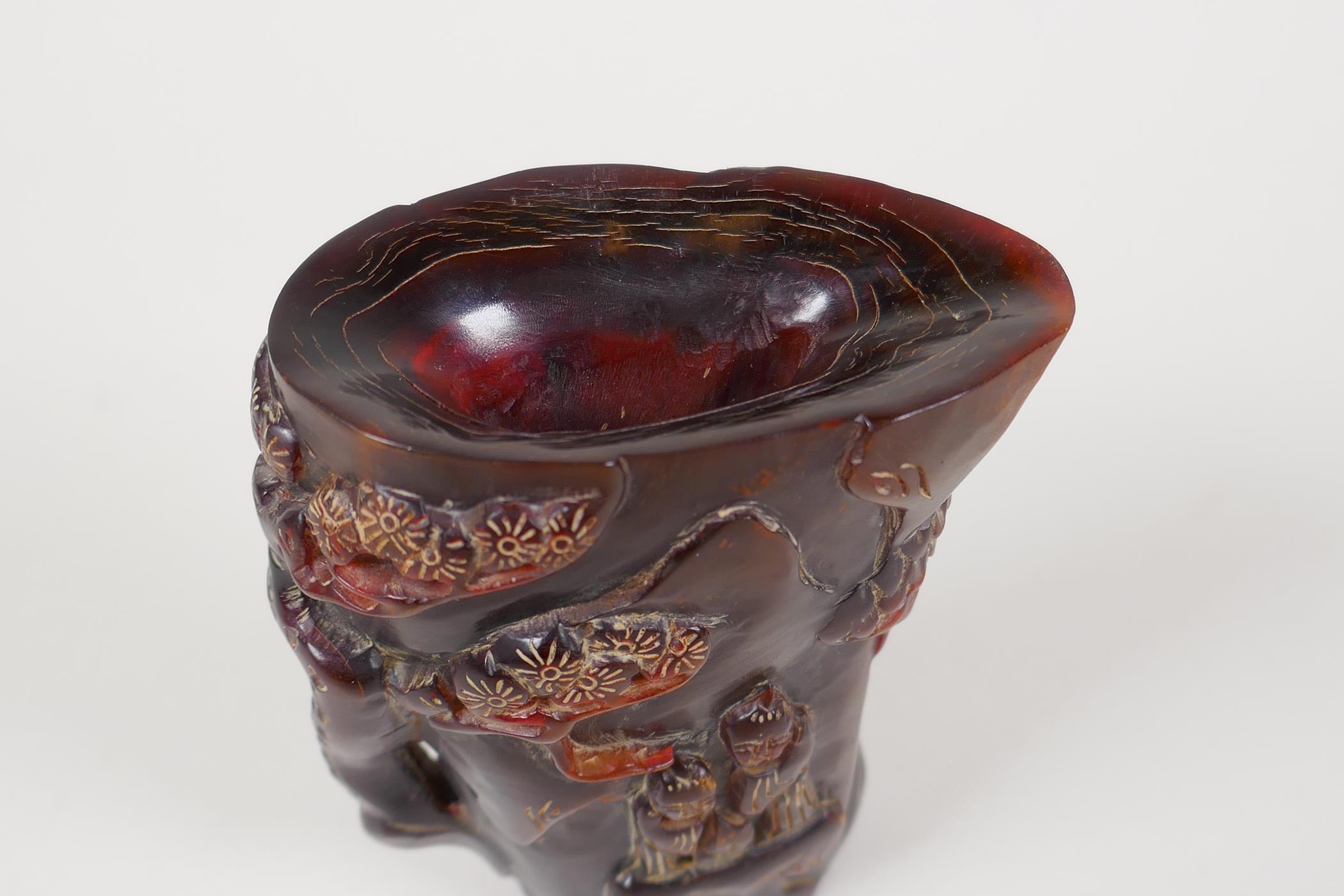 A Chinese carved horn libation cup, decorated with figures beneath trees, inscribed 4 character mark - Image 5 of 6