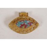 A Persian gilt metal pendant set with stone intaglio
