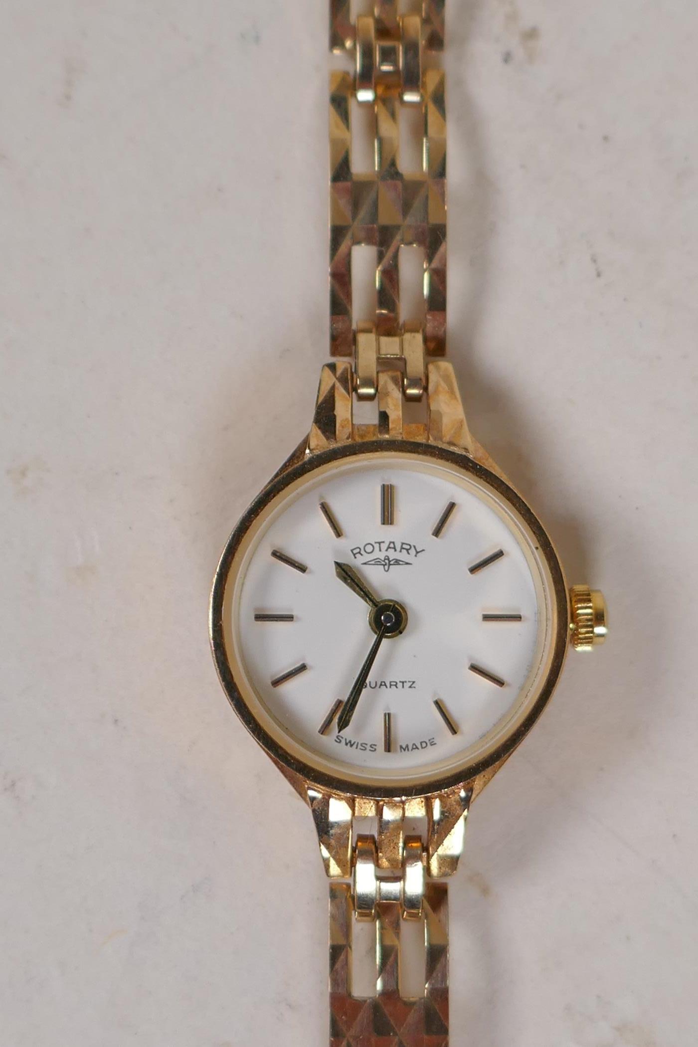 A lady's 9ct gold Rotary dress watch on a 9ct gold fancy link bracelet, 10.4g gross