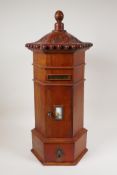 A fruitwood table top post box, 21½" high