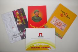 Four Chinese commemorative stamp sets containing facsimile stamp sets, largest 9" x 12"