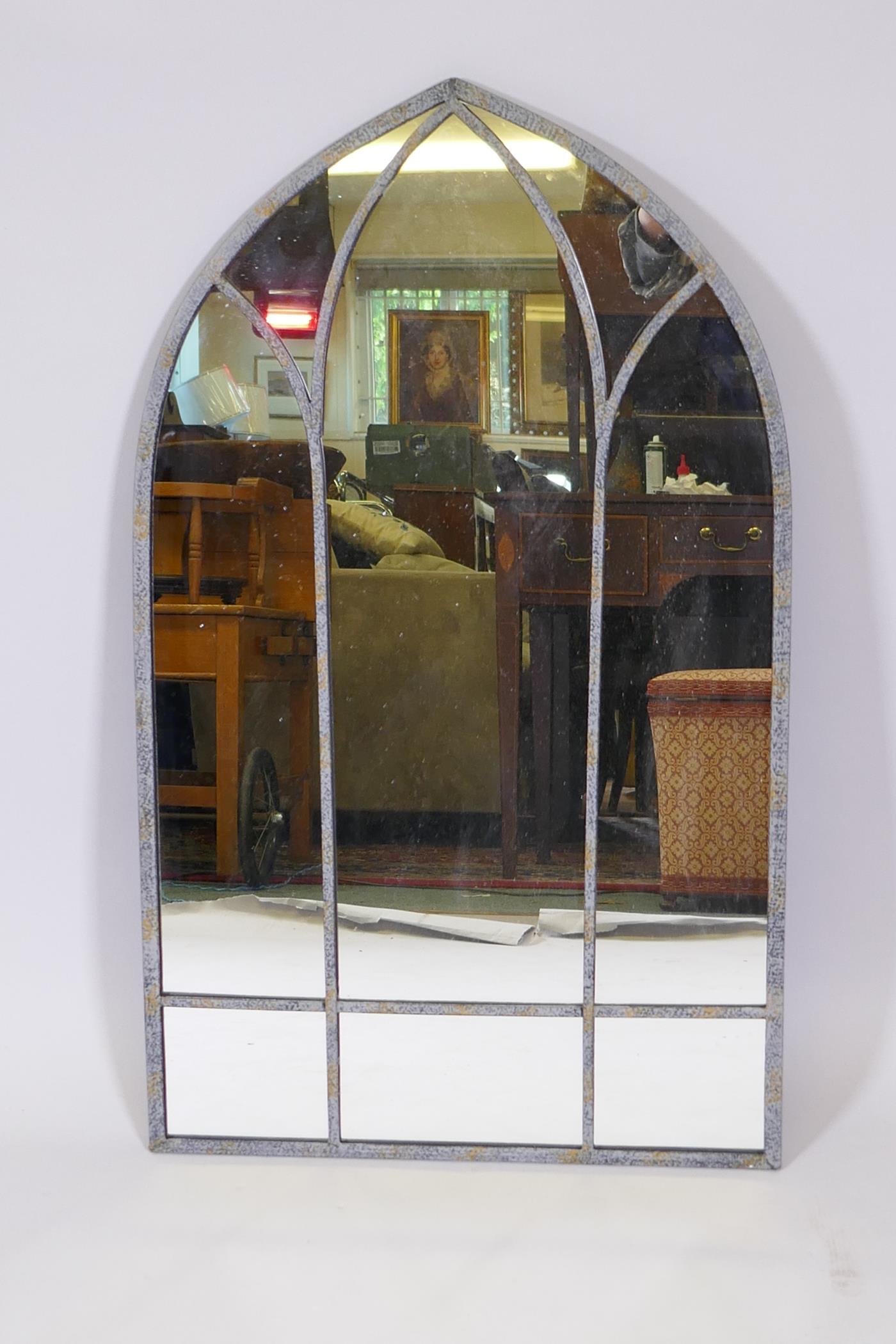 A metal framed arch top conservatory mirror with Gothic style lattice decoration, 32" x 19"