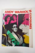 One volume, Andy Warhol's 'Exposures', featuring photographs of celebrities from the 1970s,