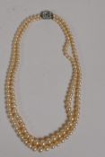 A vintage 'Ciro' two string graduated faux pearl necklace, 15" long