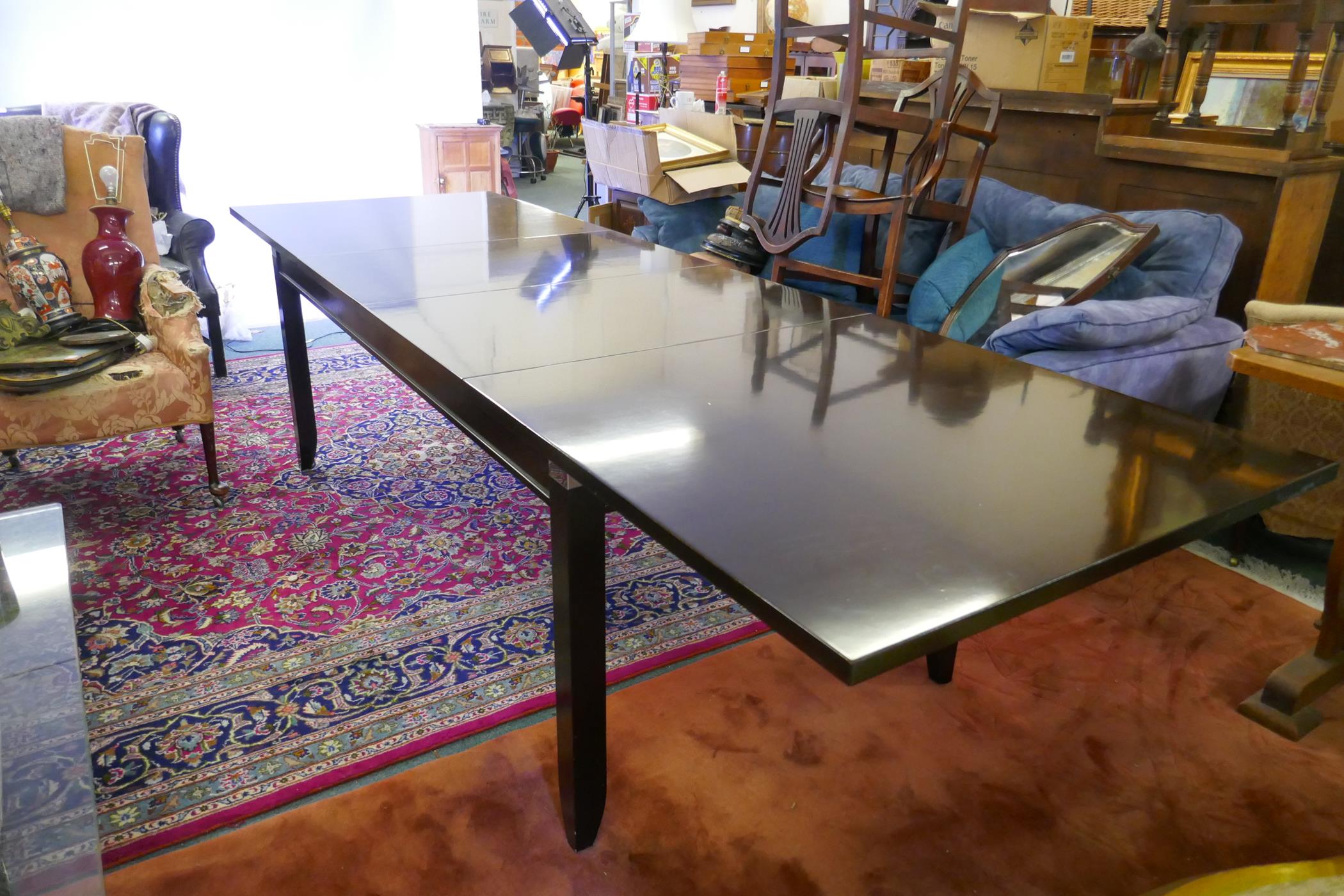 An Italian 'Selva' extending dining table with two leaves, 126" x 39", 31" high extended