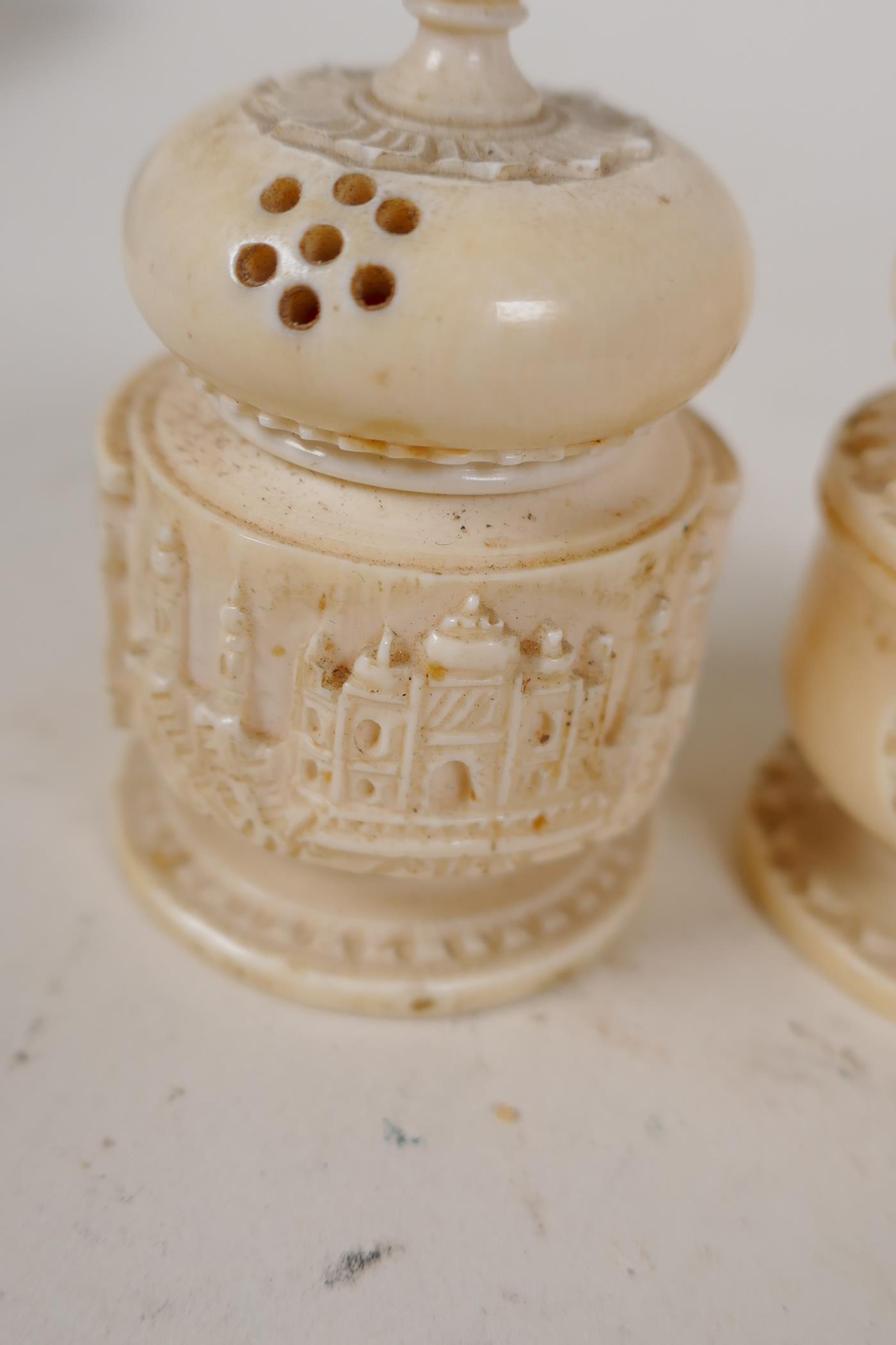An Indian ivory cruet carved as temple towers, 2" high, and a similar smaller cruet - Image 4 of 4