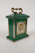 A polished brass and faux malachite repeater desk clock, repairs to malachite panels, 5" x 3", 6½"