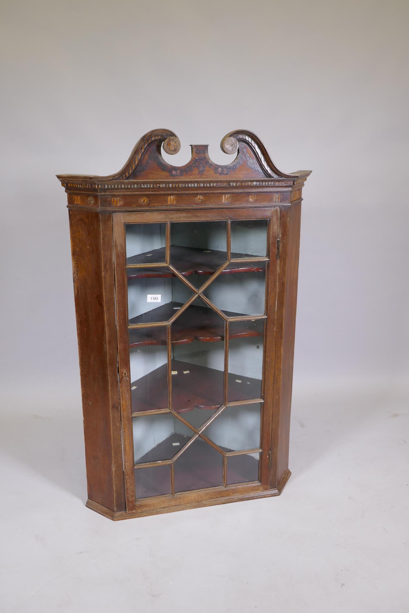 A C19th mahogany hanging corner cupboard with an astragal glazed door, with painted and inlaid - Image 2 of 3