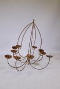 A wrought iron ten branch chandelier, 33" drop