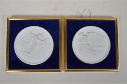 A pair of Bing & Grondahl 'Day and Night' relief bisque plaques after Bertel Thorvaldsen, framed,
