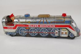 A Japanese tin plate toy train, 'Silver Mountain', 15½" long, not tested