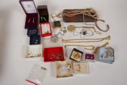 A quantity of costume jewellery including eight pairs of 9ct gold earrings, pendant, music box,