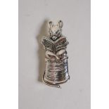 A sterling silver brooch in the form of a tailor mouse, 1½"