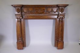 A hardwood five place surround with carved and moulded classical style decoration, 64" x 10" x 52"