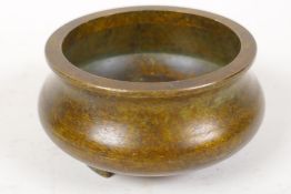 A Chinese bronze censer with impressed seal mark to base, 3" diameter