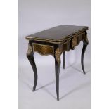A French Napoleon III style ebonised card table, with brass inlaid decoration and mounts, shaped