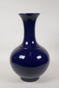 A powder blue glazed porcelain vase, Chinese Qianlong seal mark to base, 13" high